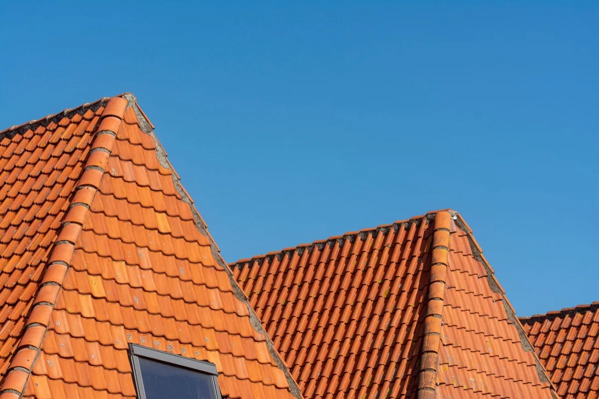 Clay barrel tile rooflines on homes in Biloxi, MS