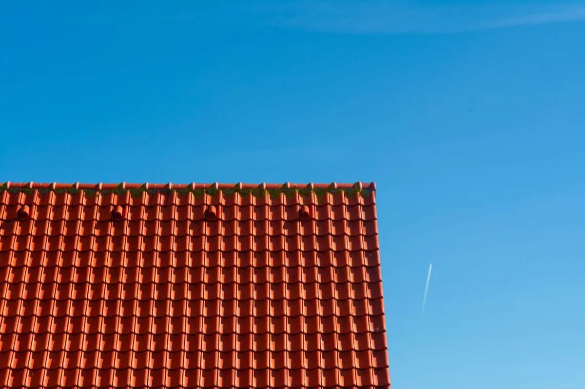 Tile roof gable in full sun, the kind of exposure that sets roof life in Biloxi, MS